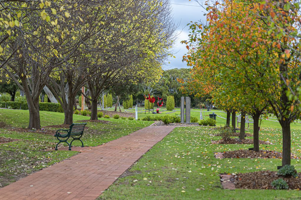 Centennial Park's Martinique Grove overlooking Poppies and Ulysses sculptures in the distance